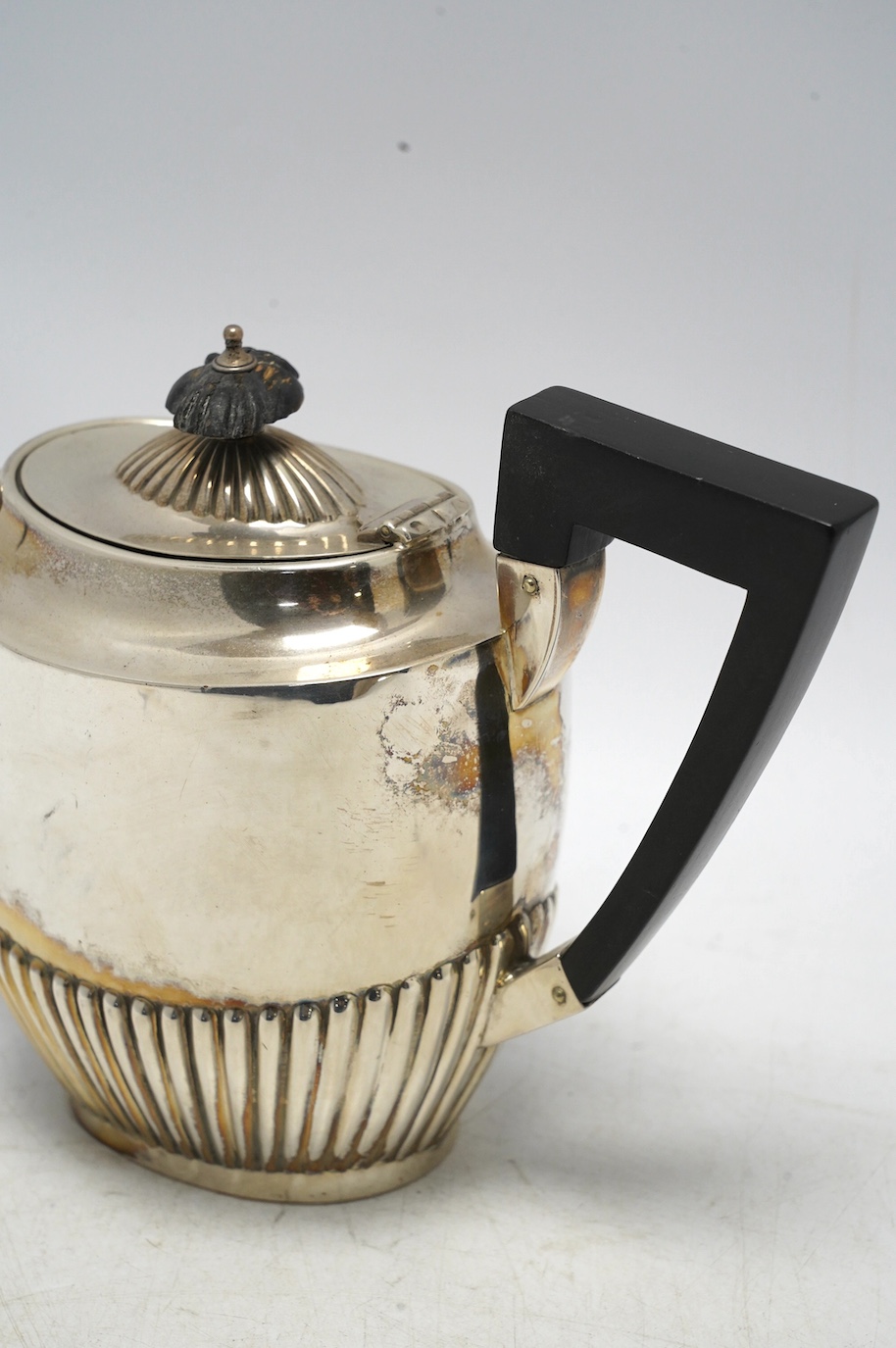 A late Victorian demi-fluted silver oval teapot, by Henry Bourne, Birmingham, 1896, gross weight 11.4oz. Condition - fair